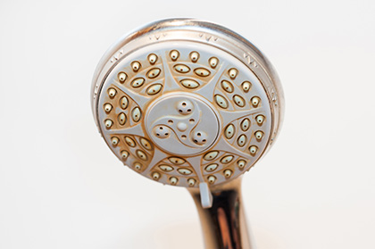 Hard water stains on shower head